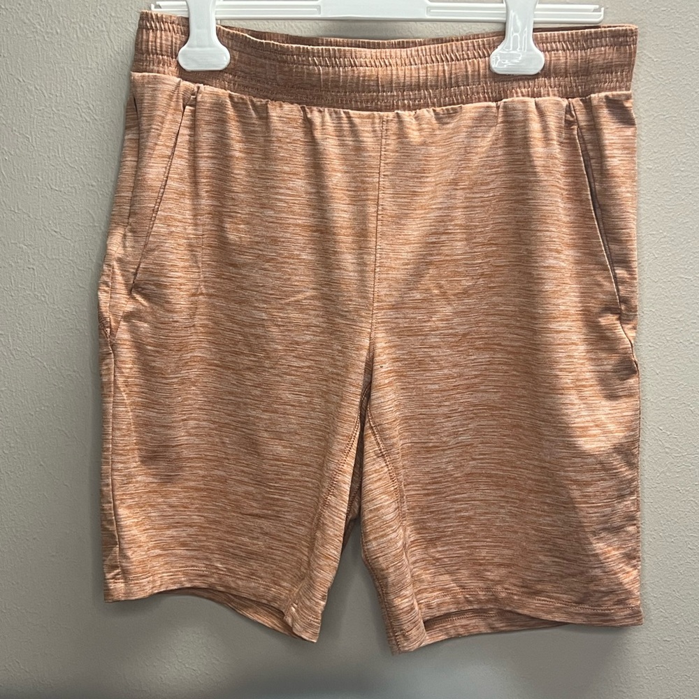 Heathered Orange athleisure shorts. Medium